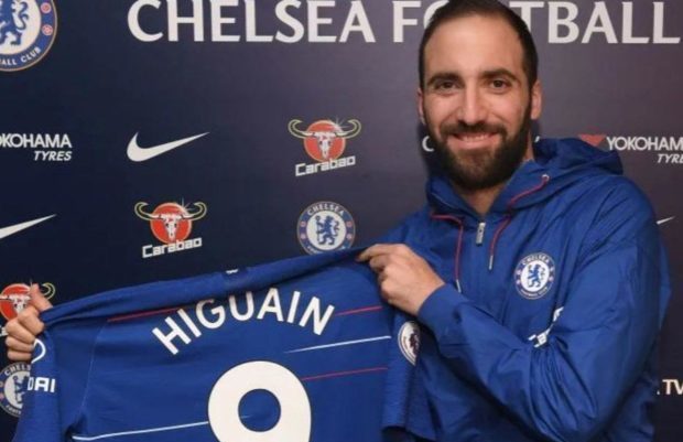 Gonzalo Higuain poses with No.9 shirt 